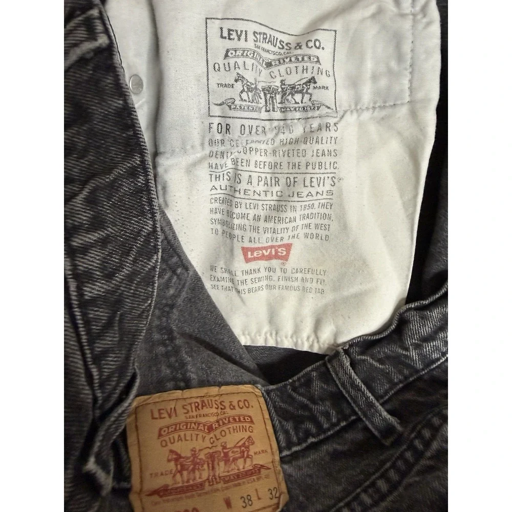 Vintage Levi's 560 Jeans 38x32 Black Loose Tapered Made in USA 90's 1993 Fading